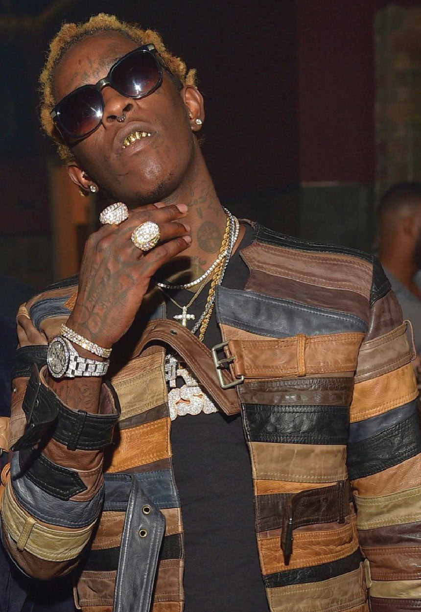 The Story Behind Margiela's Belt Jacket