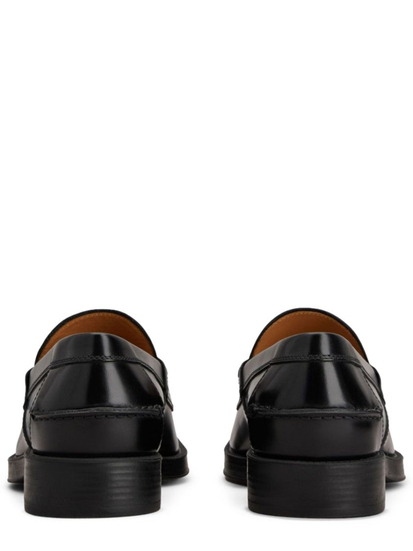 Tod's Black Penny Strap Calfskin Loafers