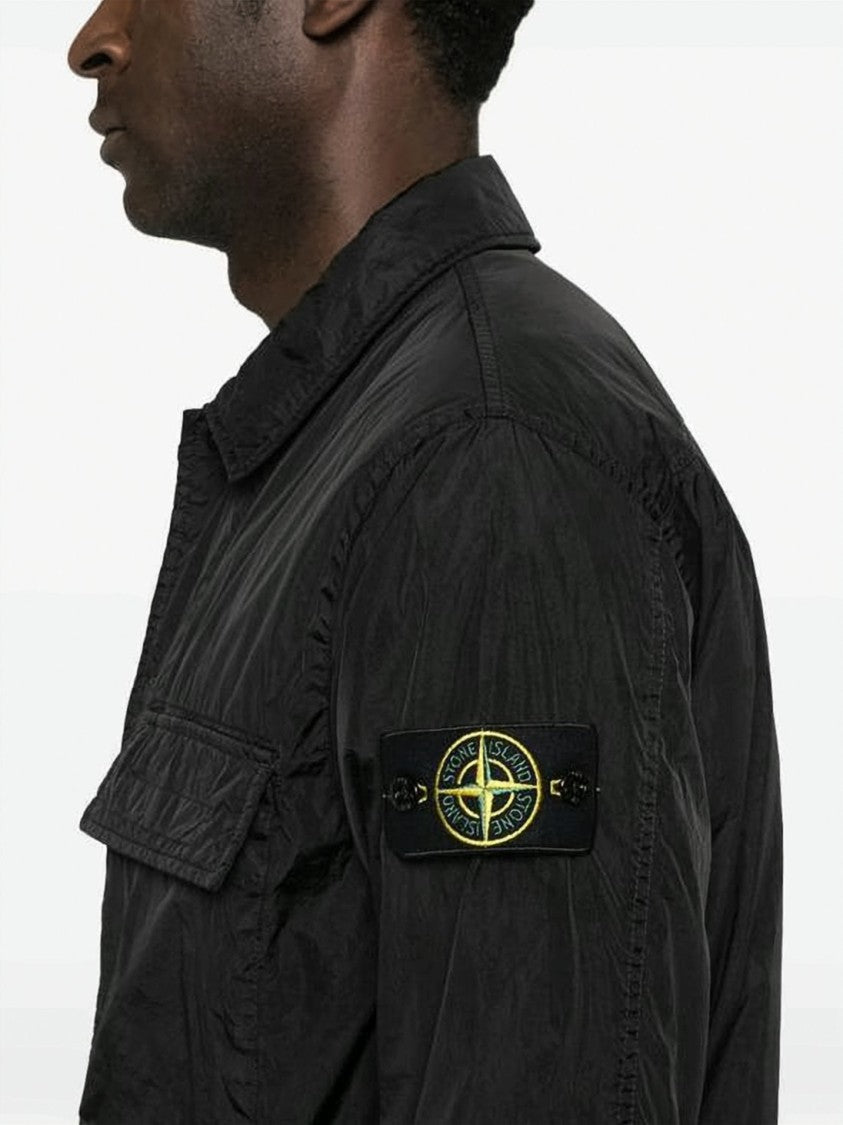 Stone Island Black Minimalist Technical Jacket With Flap Pocket And Iconic Patch