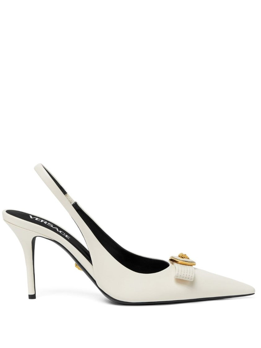 Versace Pointed Toe Slingback Heels With Textured Bow And Gold Medallion
