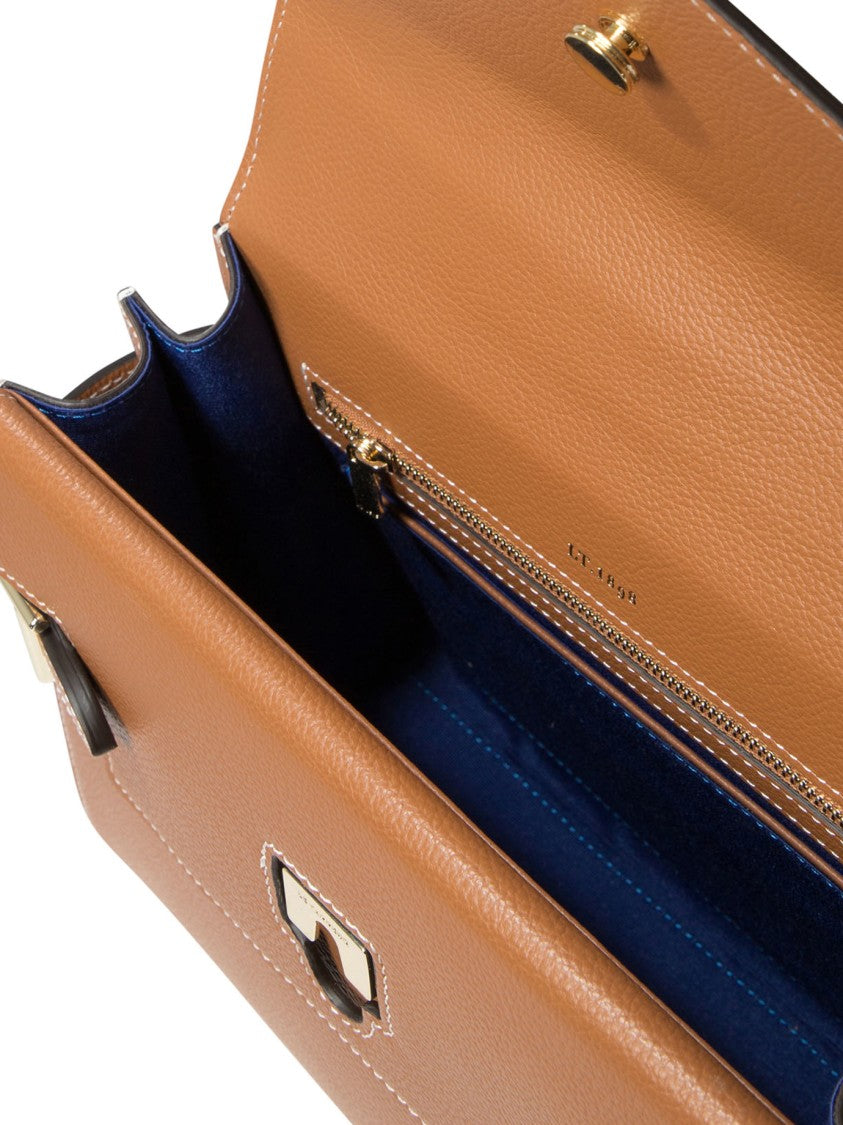 Le Tanneur Compact Structured Handbag With Triangular Flap