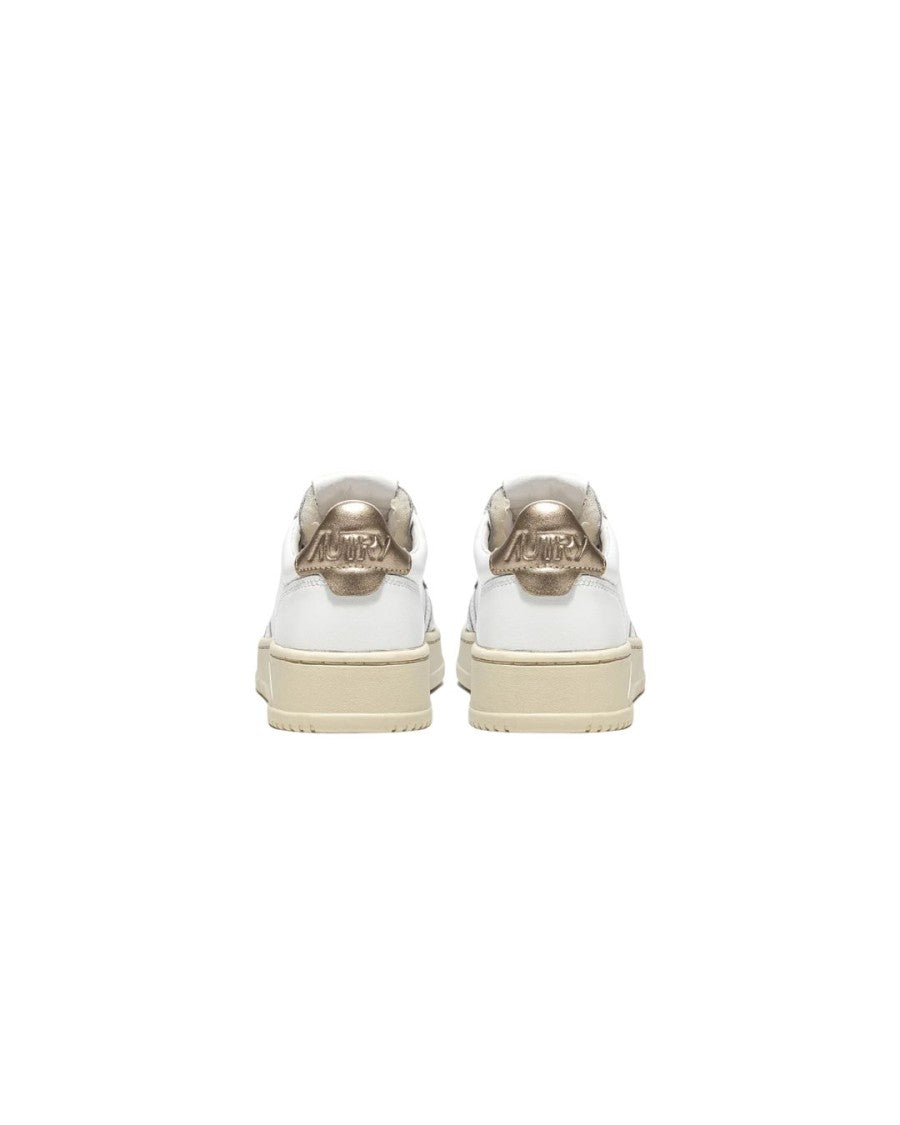 Autry Medalist Low Sneakers In White And Metallic Gold Leather