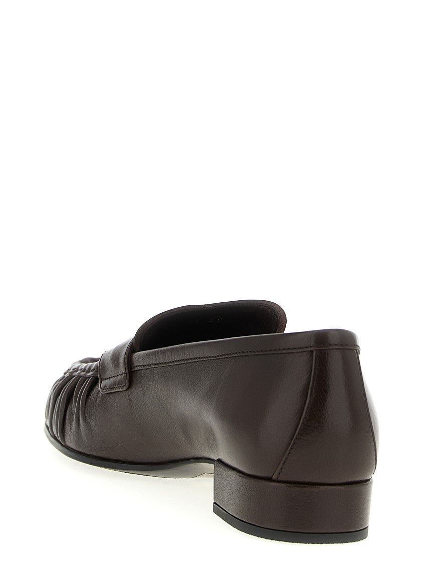 Prada Curled Toe Moccasins