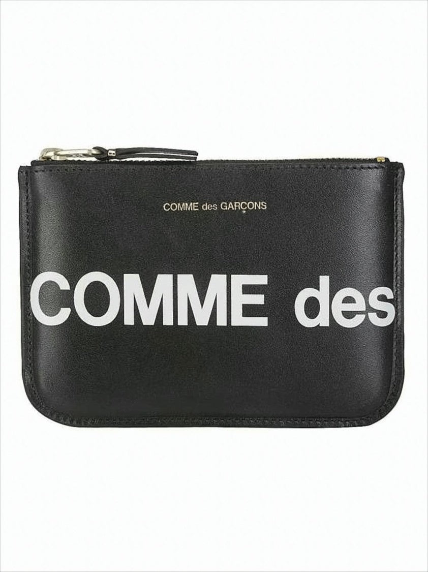 Comme Des Garçons Rectangular Cowhide Clutch With Gold Accents And Typography