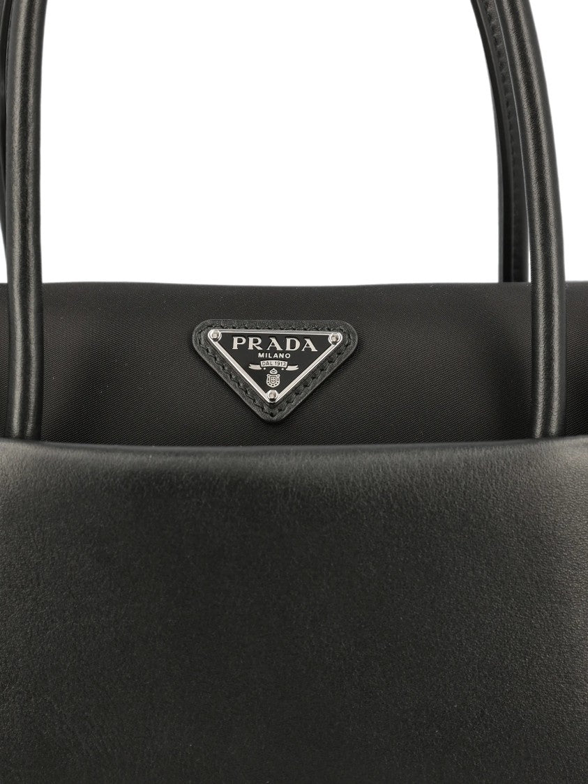 Prada Structured Black Handbag With Versatile Carrying Options
