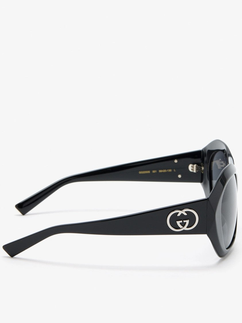 Gucci Cat-Eye Sunglasses With Glossy Black Frame And Silver Logo