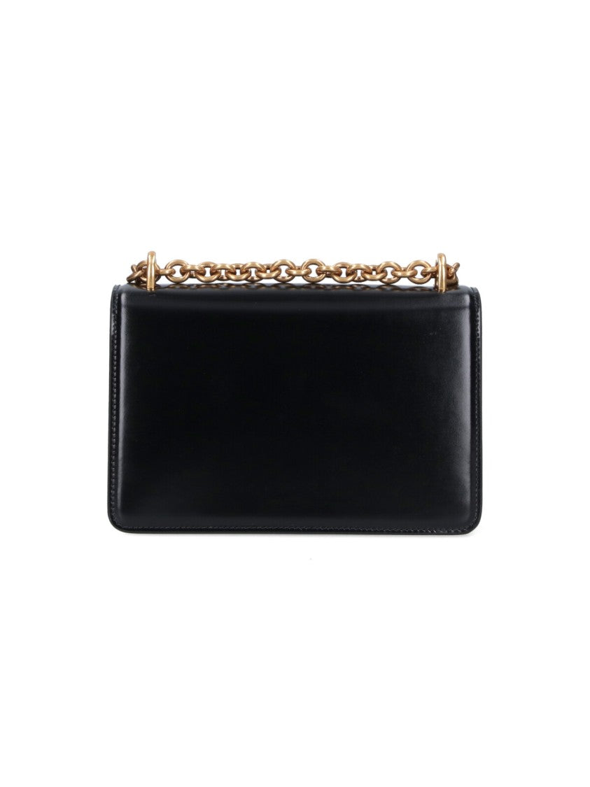 Valentino Garavani Structured Black Handbag With Gold-Tone Emblem And Chain Strap