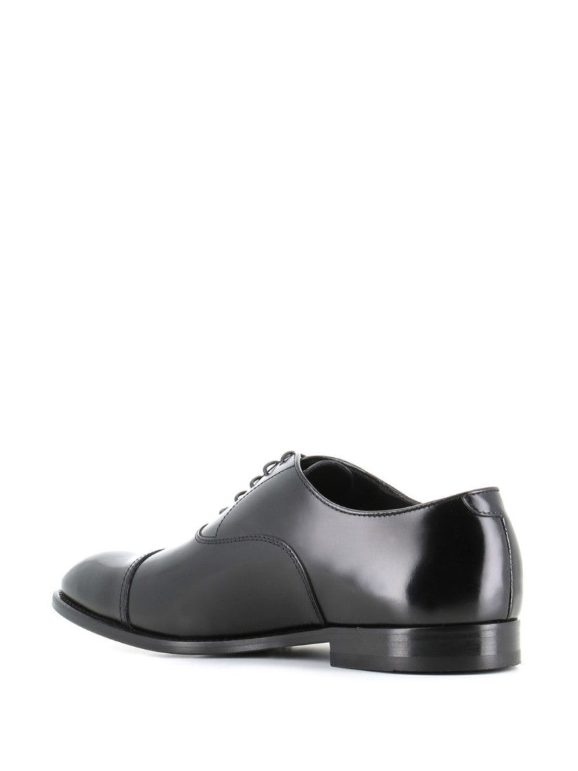 Doucal's Polished Black Oxford Shoes With Subtle Stitching Details