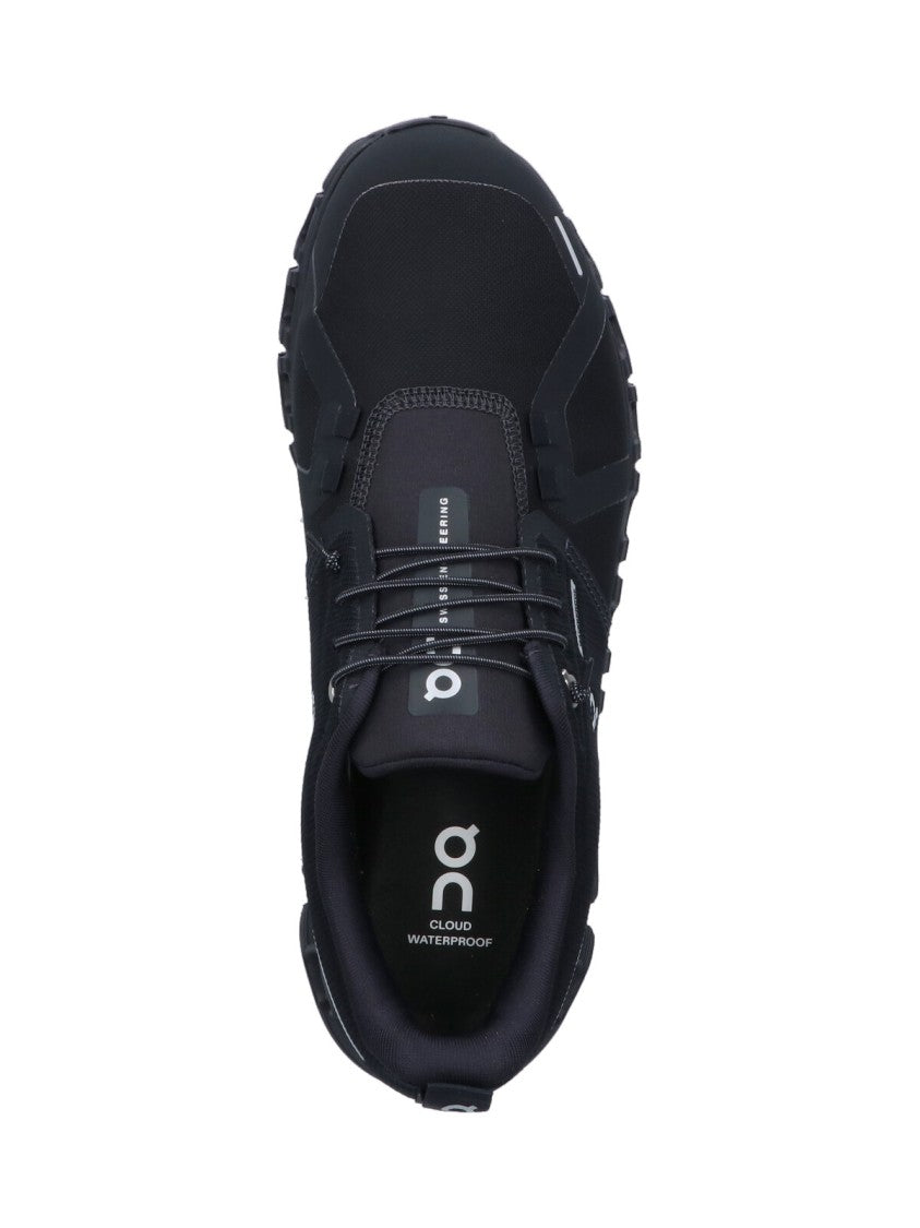 On Low-Profile Sneakers With Segmented Sole And Reflective Accents