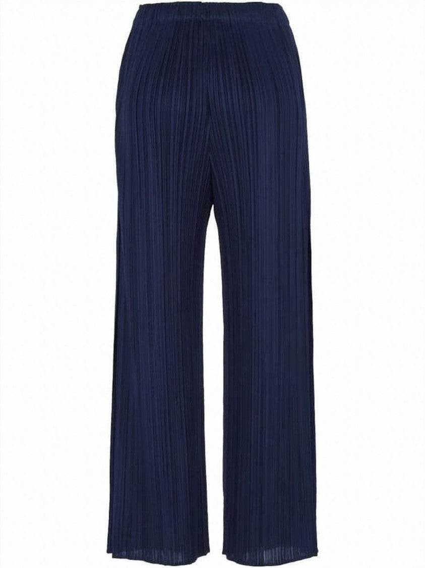 Pleats Please Wide-Leg Pleated Pants With Fluid Texture