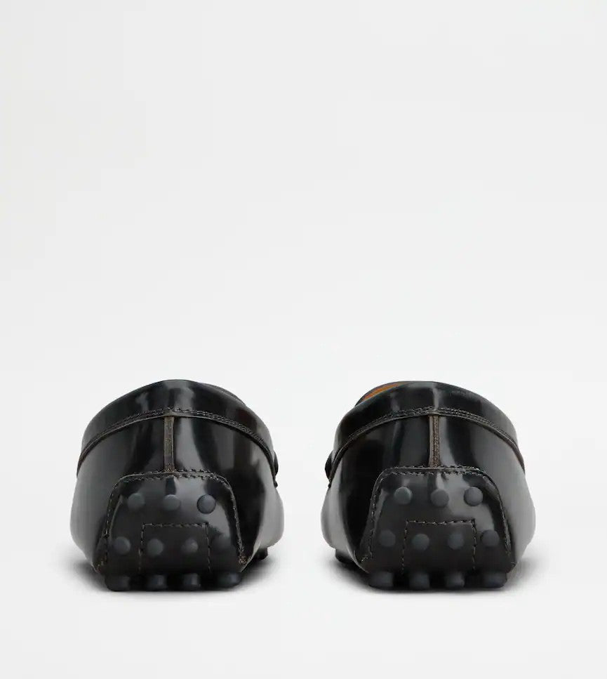 Tod's Polished Calfskin Moccasins With Metallic Bar Accent