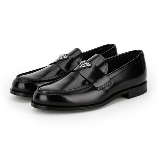 Prada Polished Leather Loafers With Subtle Metallic Emblem