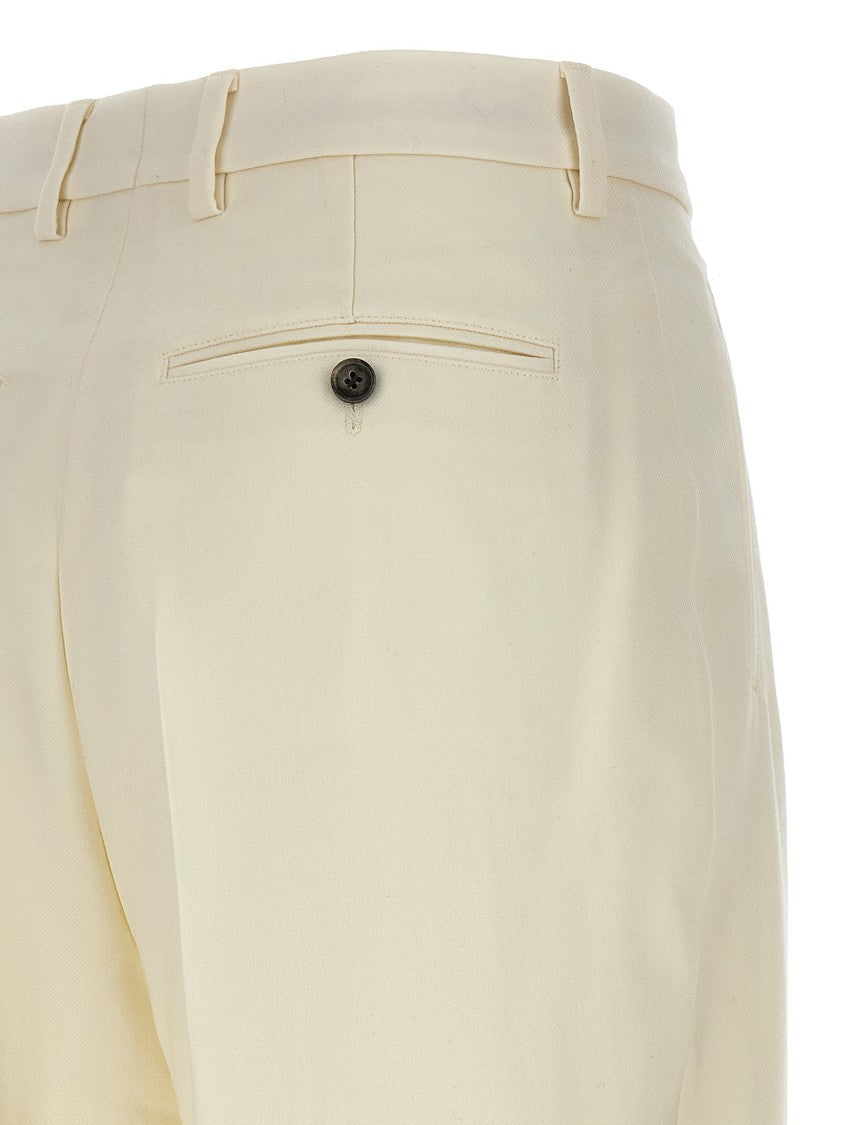 Ami Paris Tailored Wool Trousers With Front Pleats And Button Closure