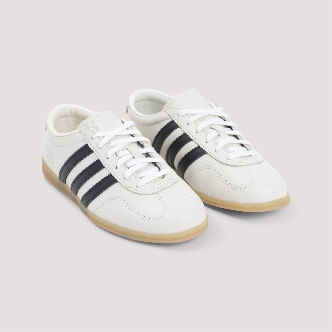 Adidas Minimalist Low-Top Leather Sneakers With Contrasting Stripes