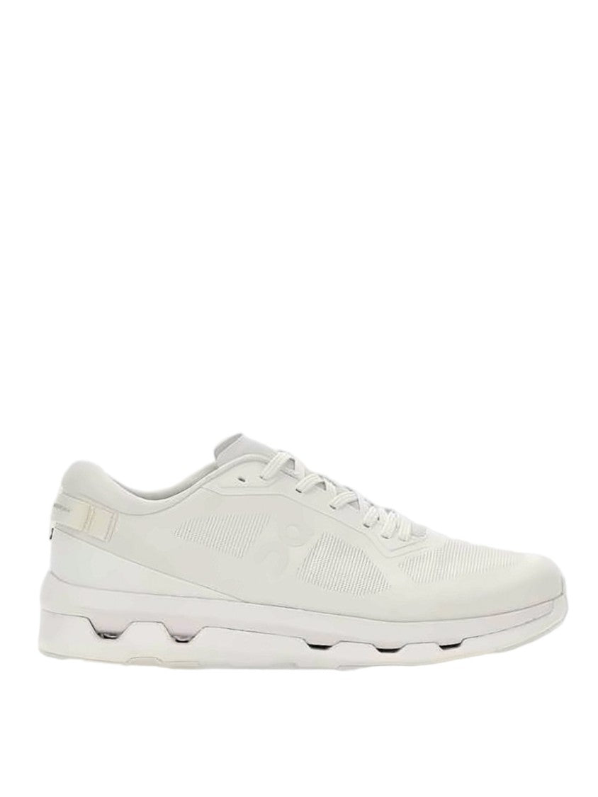 On Running Minimalist White Sneakers With Rubber Segmented Sole