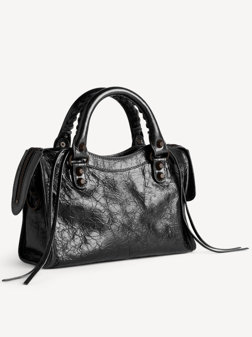 Balenciaga Compact Textured Handbag With Braided Detailing And Glossy Finish