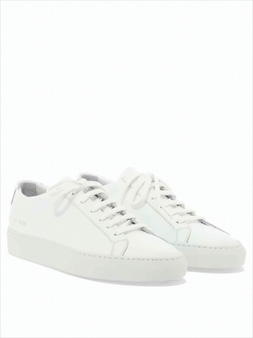 Common Projects Minimalist White Leather Sneakers With Embossed Detail