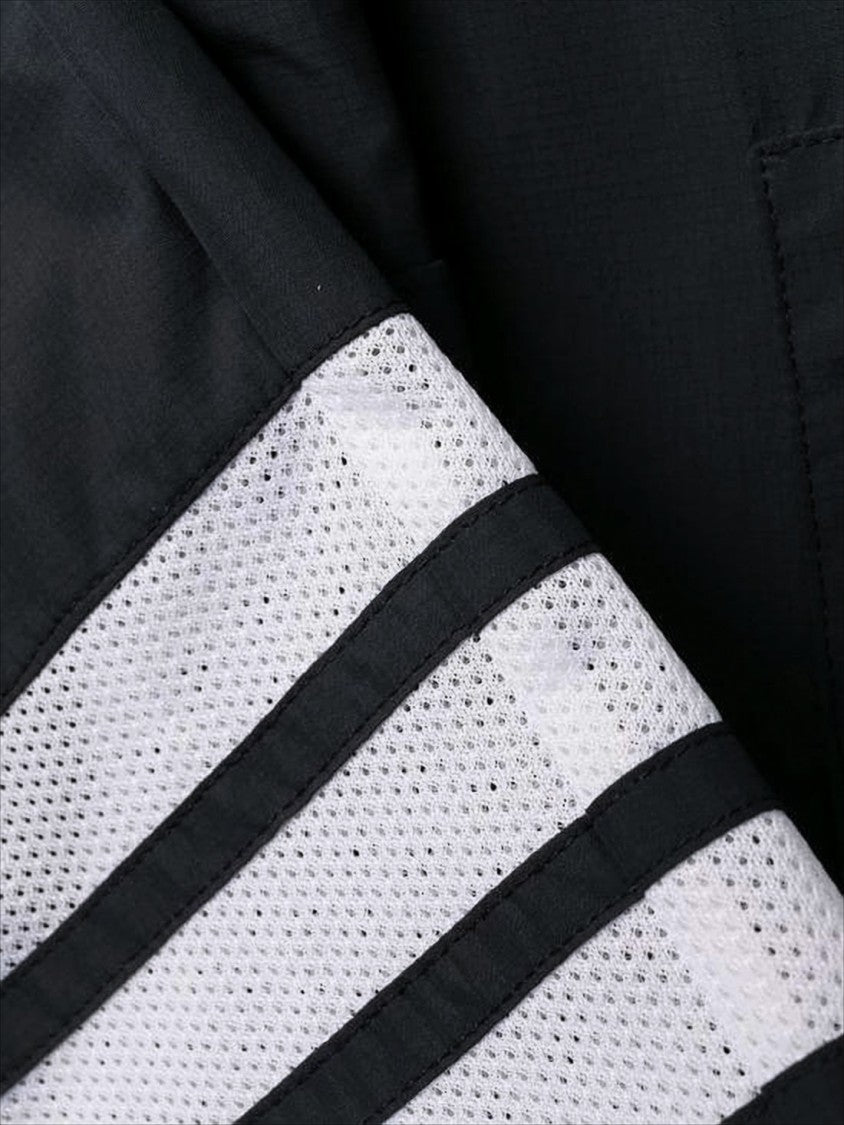 Thom Browne Sleek Black Training Jogger Pants With Distinctive Stripes