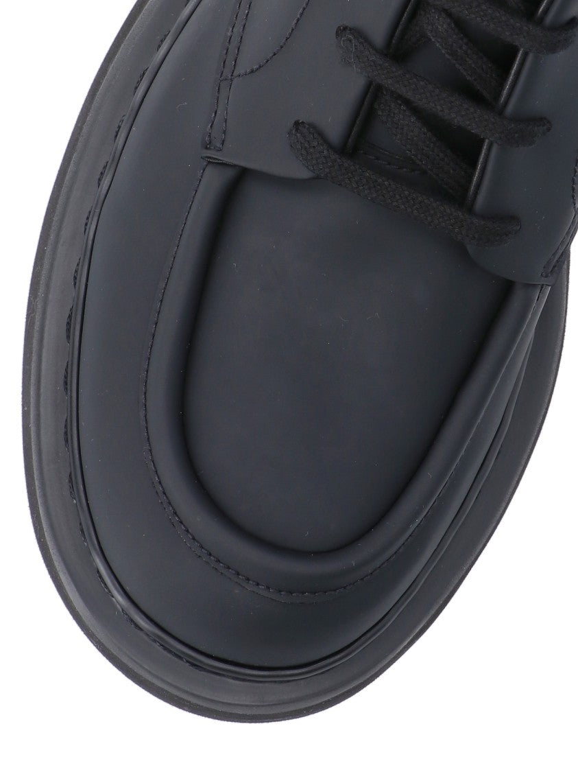 Premiata "Cal 32130" Ankle Boots In Black Rubberized Fabric