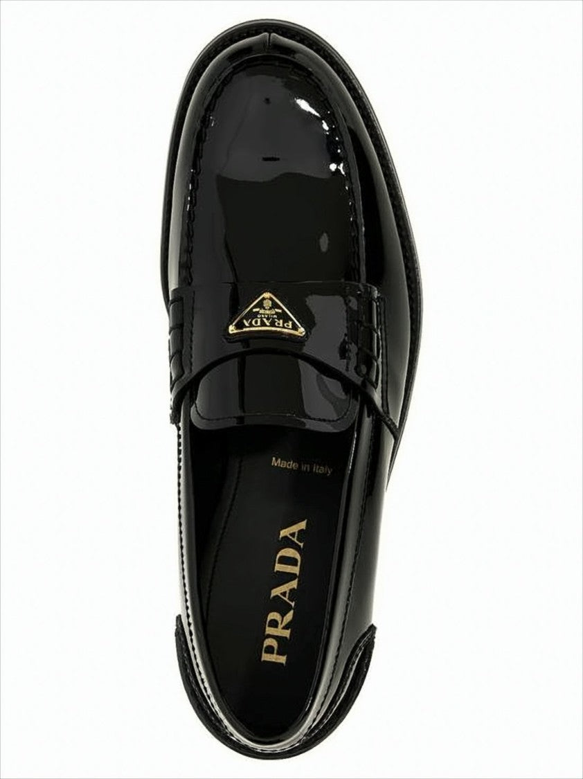 Prada Polished Calf Leather Loafers With Metallic Emblem
