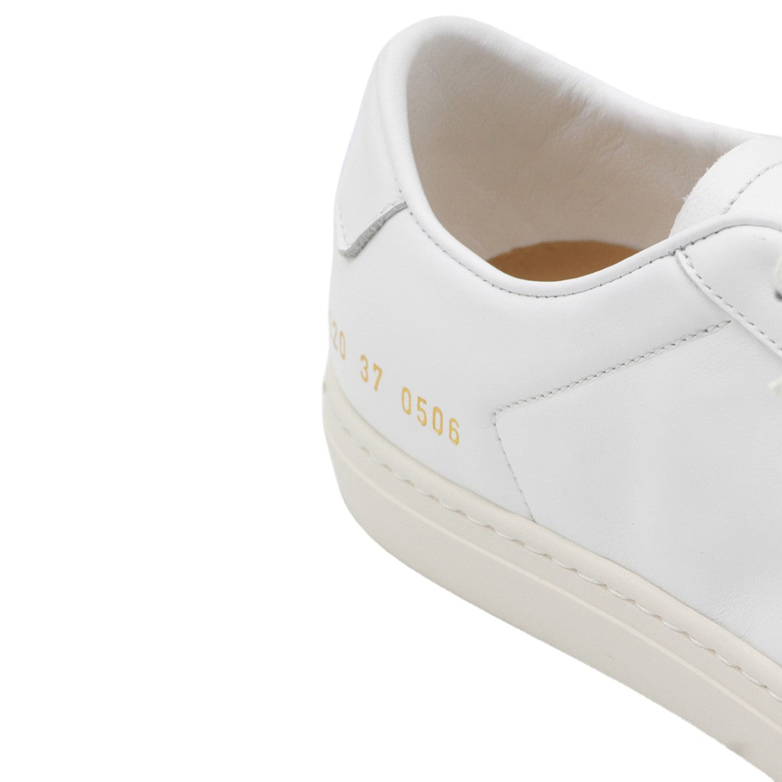 Common Projects Minimalist White Sneakers With Gold Embossed Detail
