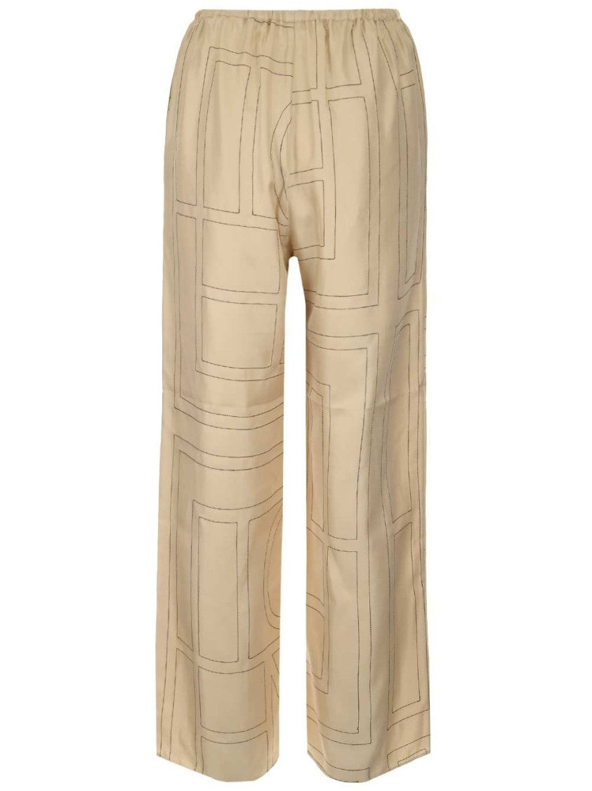 Totême Cropped Silk Pajama Bottoms With Subtle Monogram Pattern