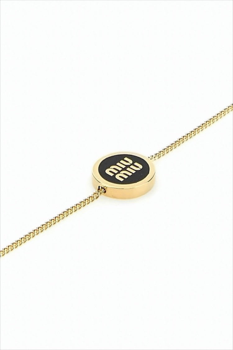 Miu Miu Gold-Tone Brass Bracelet With Oval Pendant