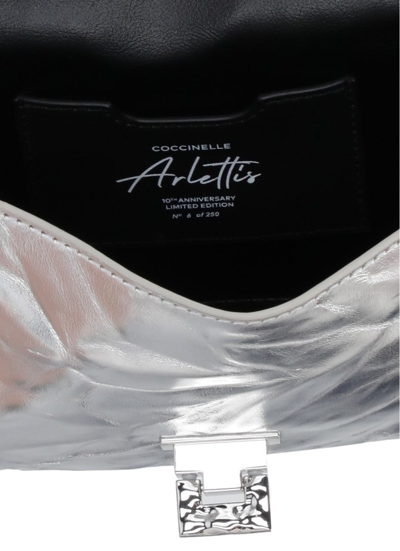 Coccinelle Arlettis Droplet Bag With Rigid Metal Handle And Adjustable Strap
