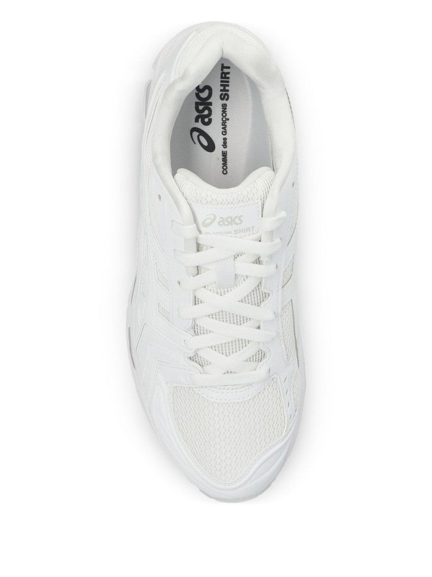 Comme Des Garçons Minimalist White Sneakers With Classic Low-Top Silhouette
