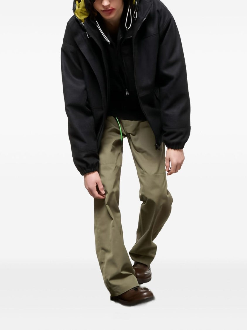 Gr10k Hooded Black Logo Jacket With Contrasting Lining And Adjustable Features