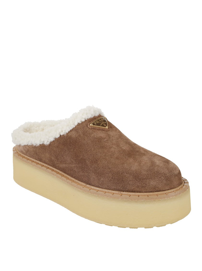 Prada Brown Suede Mules With Shearling Trim And Plush Lining