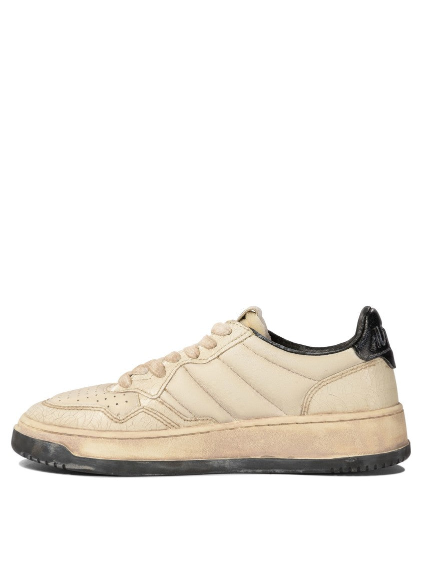 Autry Vintage-Inspired Leather Sneakers With Contrast Rubber Sole
