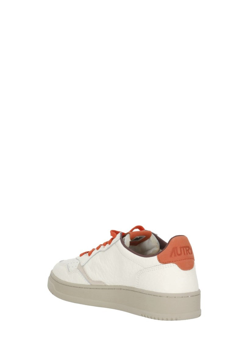 Autry White Grey Suede Orange Accents Low-Top Sneakers
