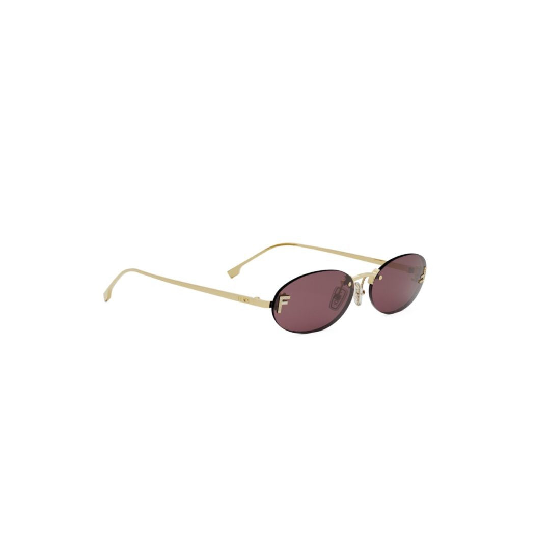 Fendi Oval Lens Sunglasses With Gold-Toned Frame And Tinted Lenses
