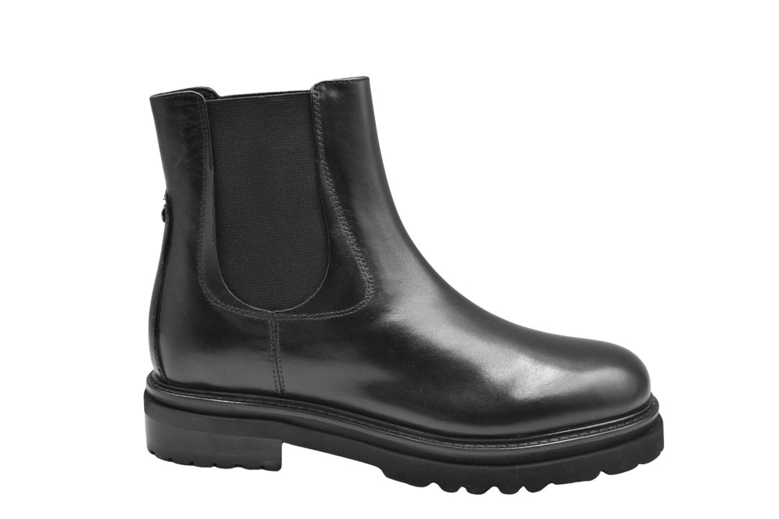 Janet & Janet Polished Leather Ankle Boots With Lug Sole