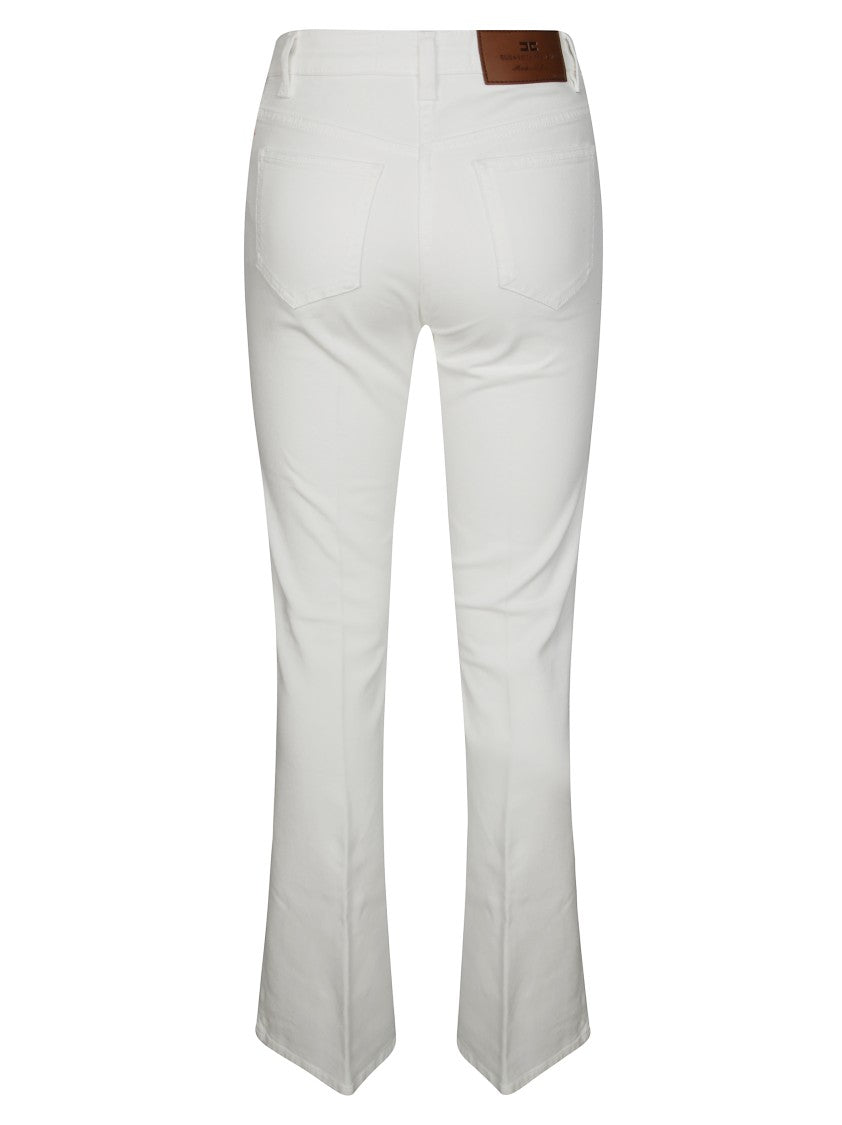 Elisabetta Franchi Flared White Pants With Gold Bow Embellishments