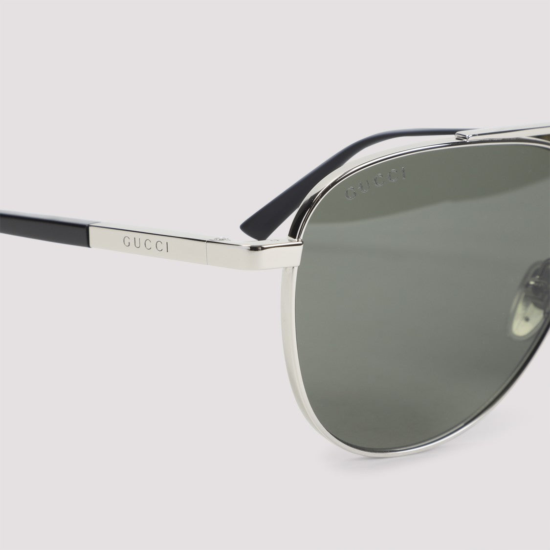 Gucci Aviator Sunglasses With Metallic Silver Frame And Adjustable Nose Pads