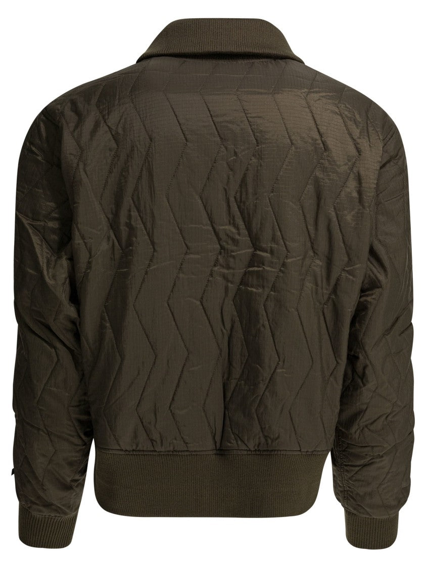 Daiwa Pier 39 Geometrically Quilted Jacket With Structured Collar And Zippered Pockets