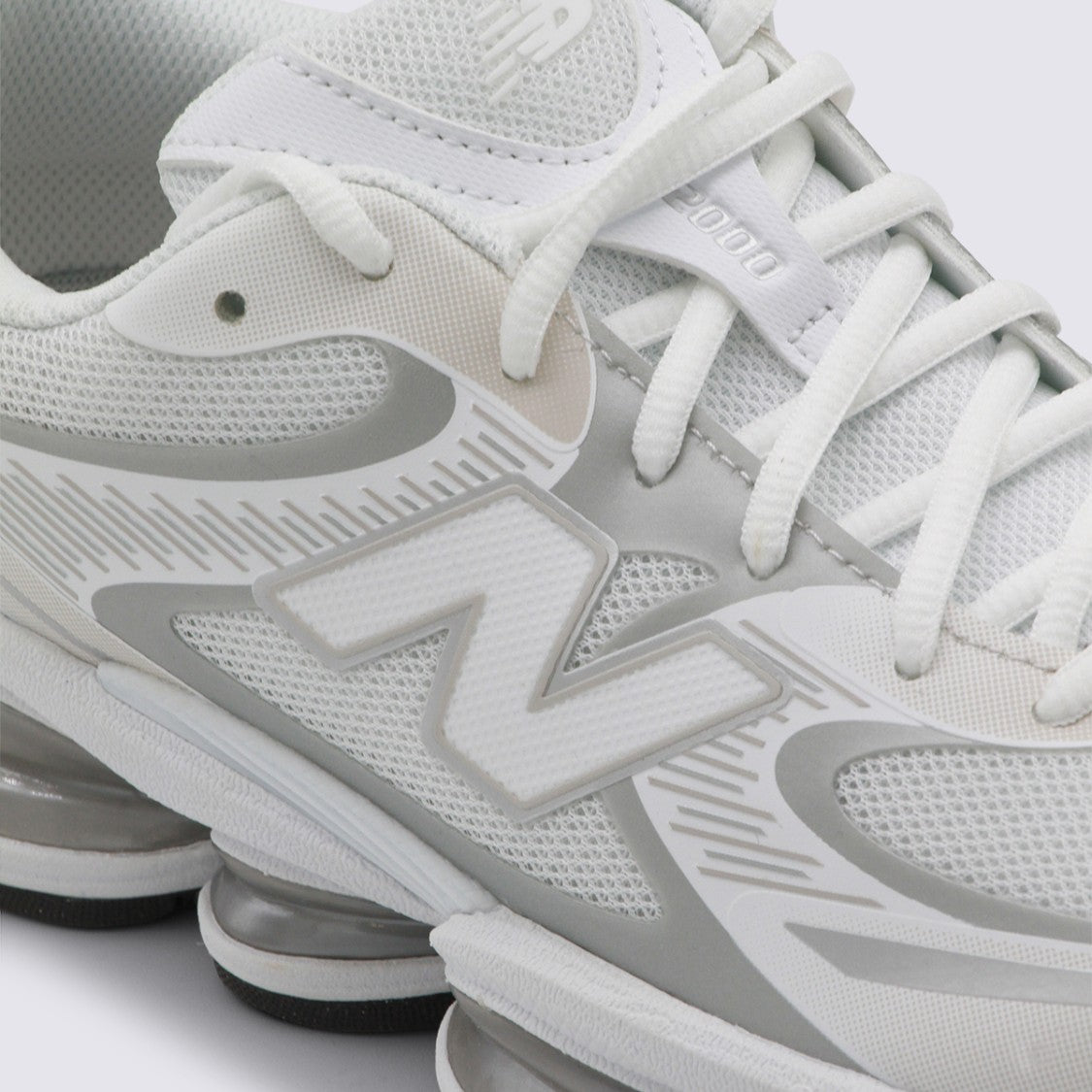 New Balance Contemporary Sneakers With Air-Cushioned Sole And Padded Collar