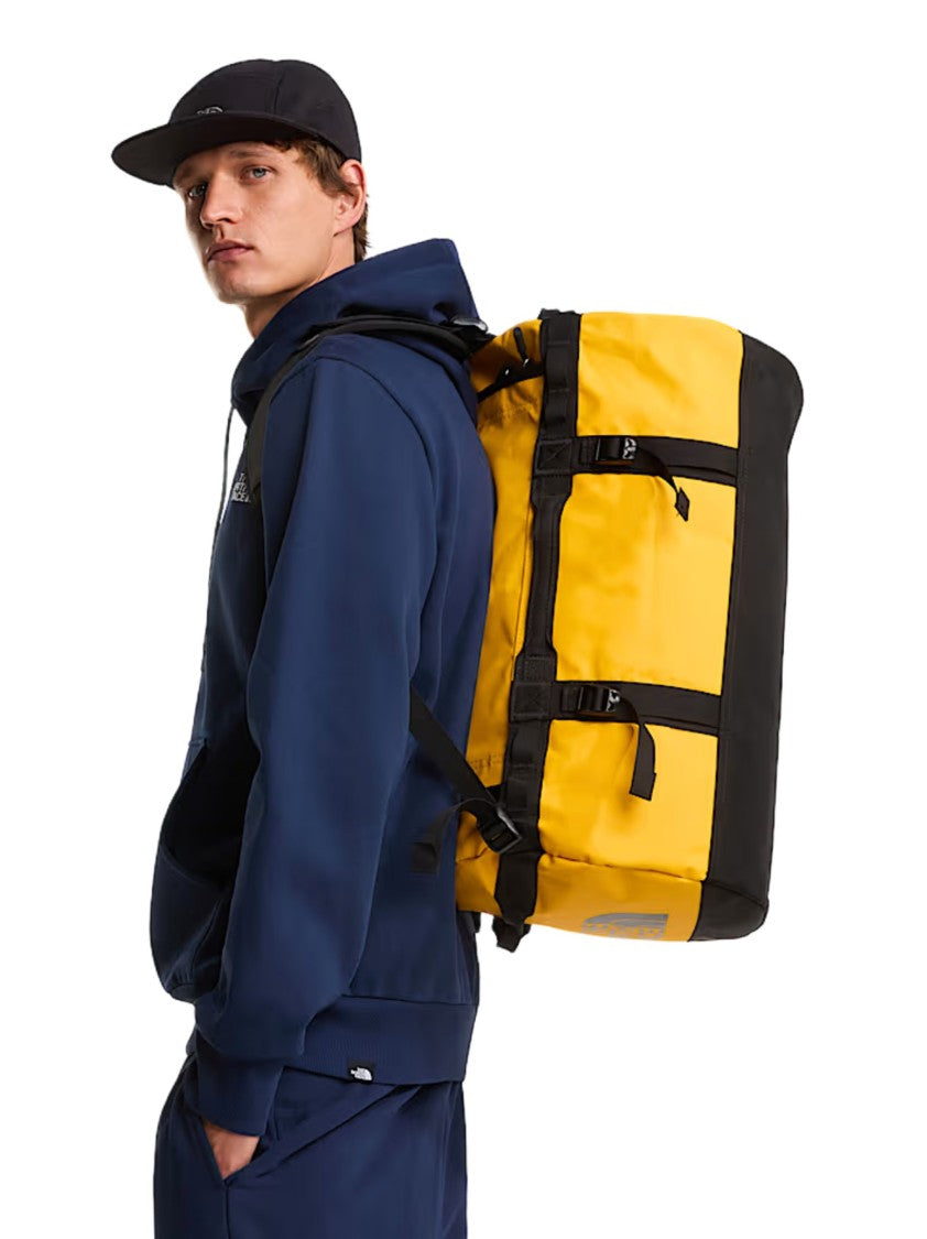 The North Face Durable Yellow Duffel Bag With Adjustable Straps