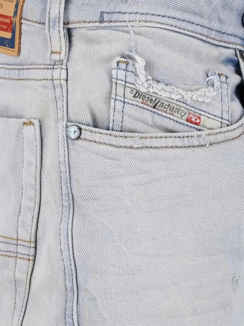 Diesel Light-Washed Denim Flared Pants With Raw Hems