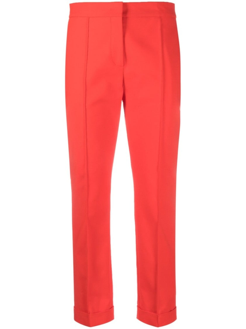Moschino Slim Cut Cropped Trousers With Exposed-Seam Detailing