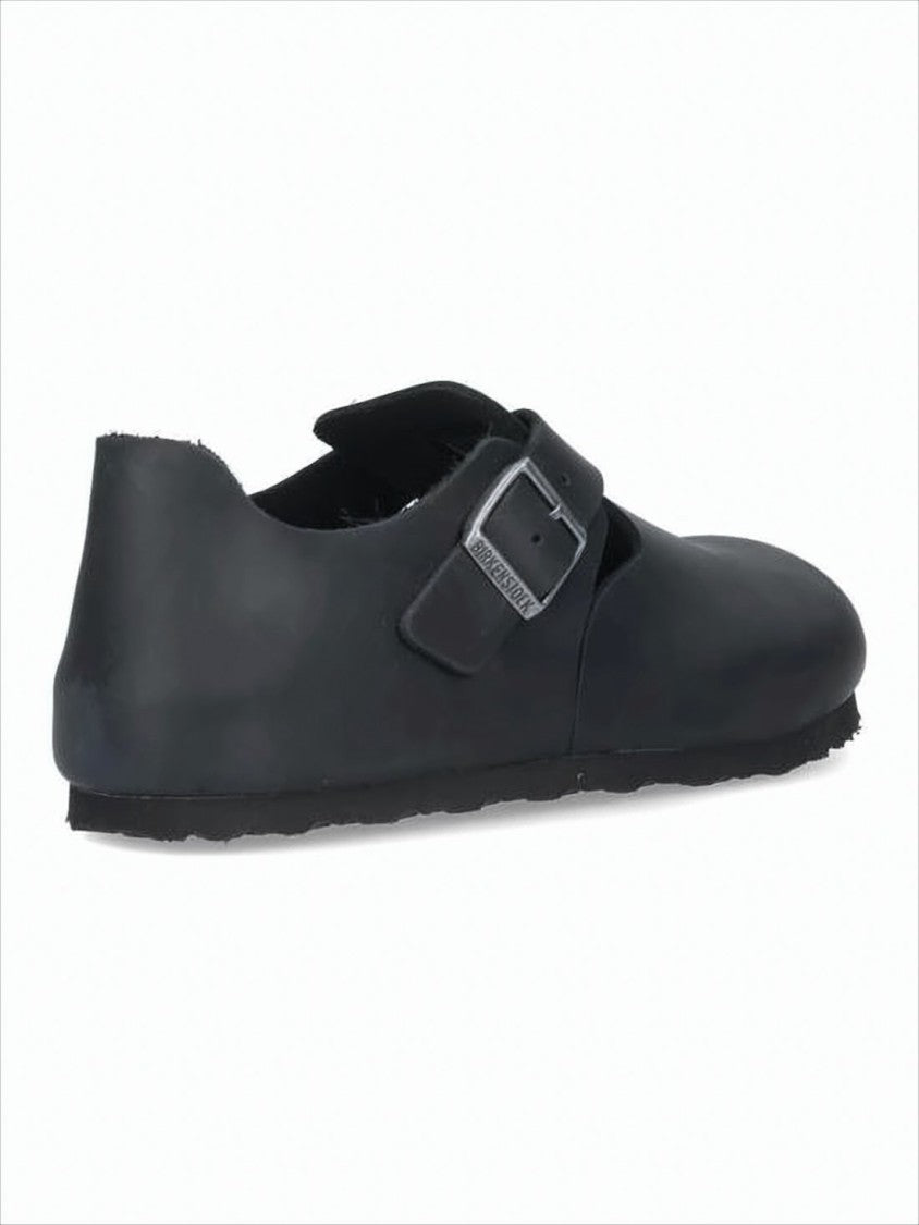 Birkenstock Closed-Toe Sandals With Adjustable Buckle And Suede Lining