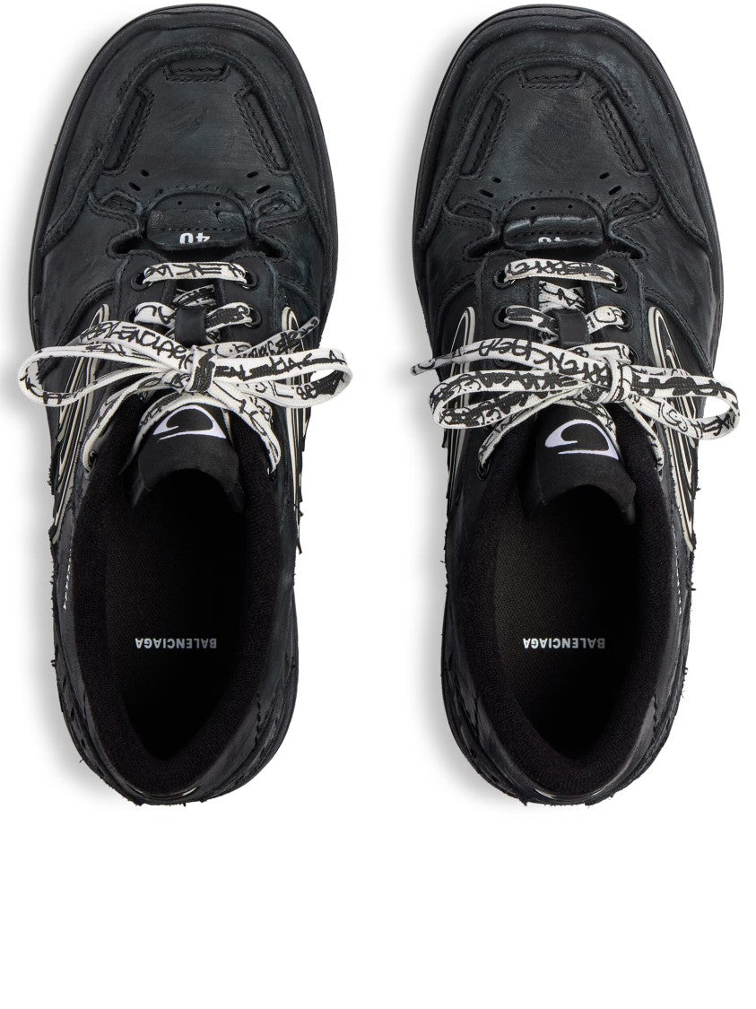 Balenciaga Sleek Black Low-Profile Sneakers With Textured Sole And Patterned Laces