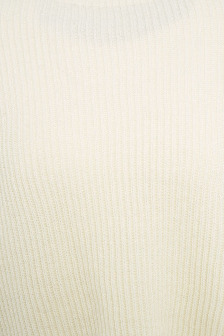 Closed Oversized Knit Sweater With High Collar And Voluminous Sleeves