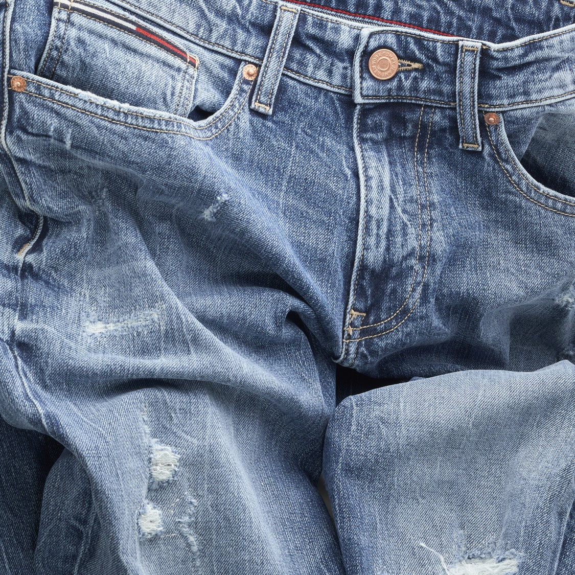 Tommy Jeans Faded Blue Denim Jeans With Distressed Detailing