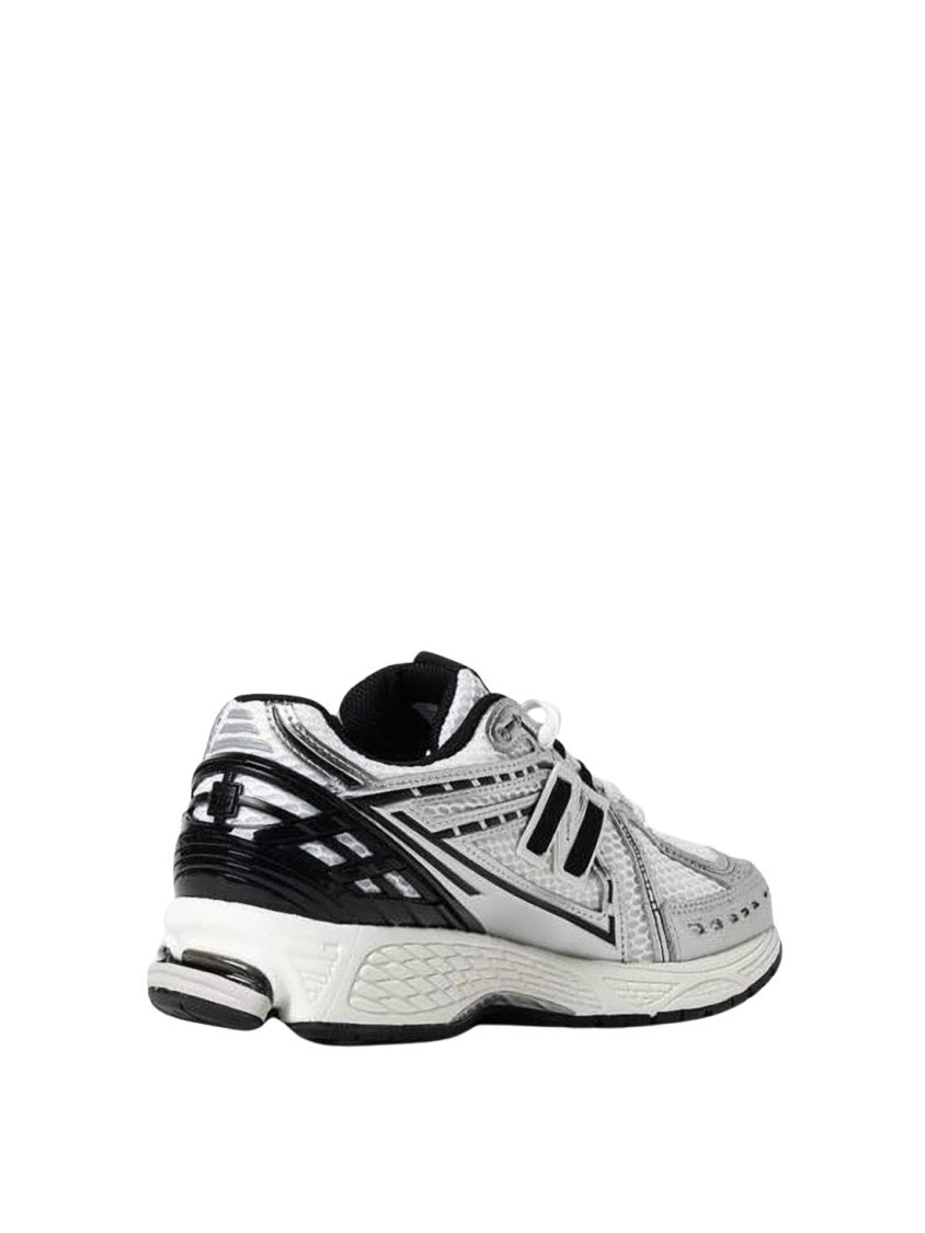 New Balance Sleek White And Silver Sneakers