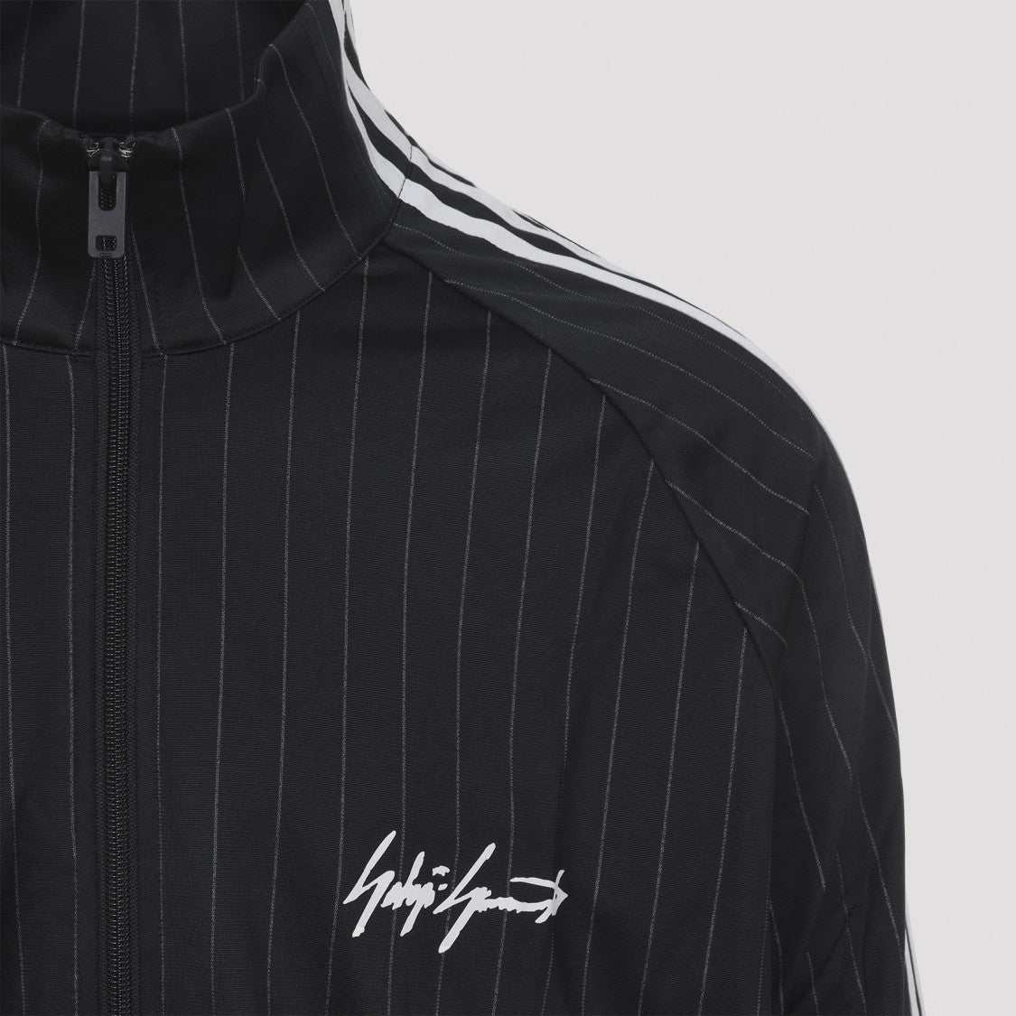 Y-3 Sleek Black Jacket With Subtle Pinstripes And Signature Branding