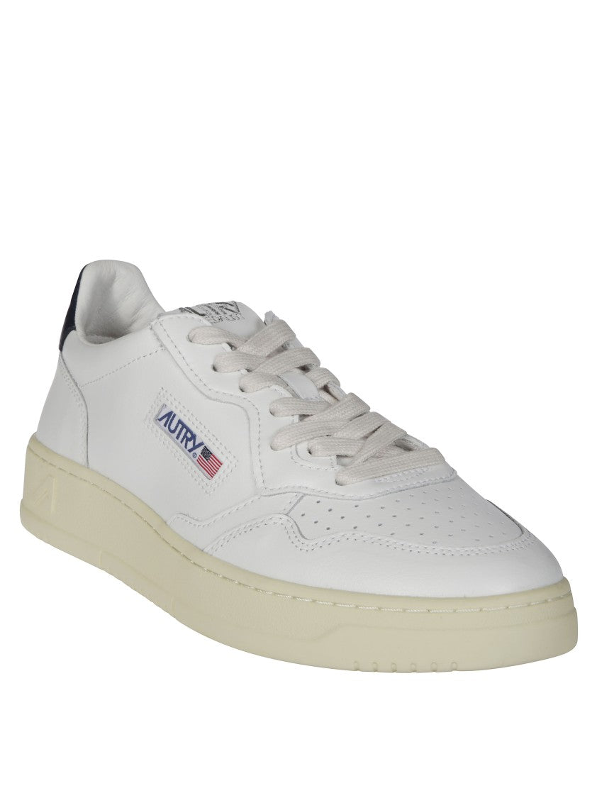 Autry White Medalist Low Navy Heel Sneakers