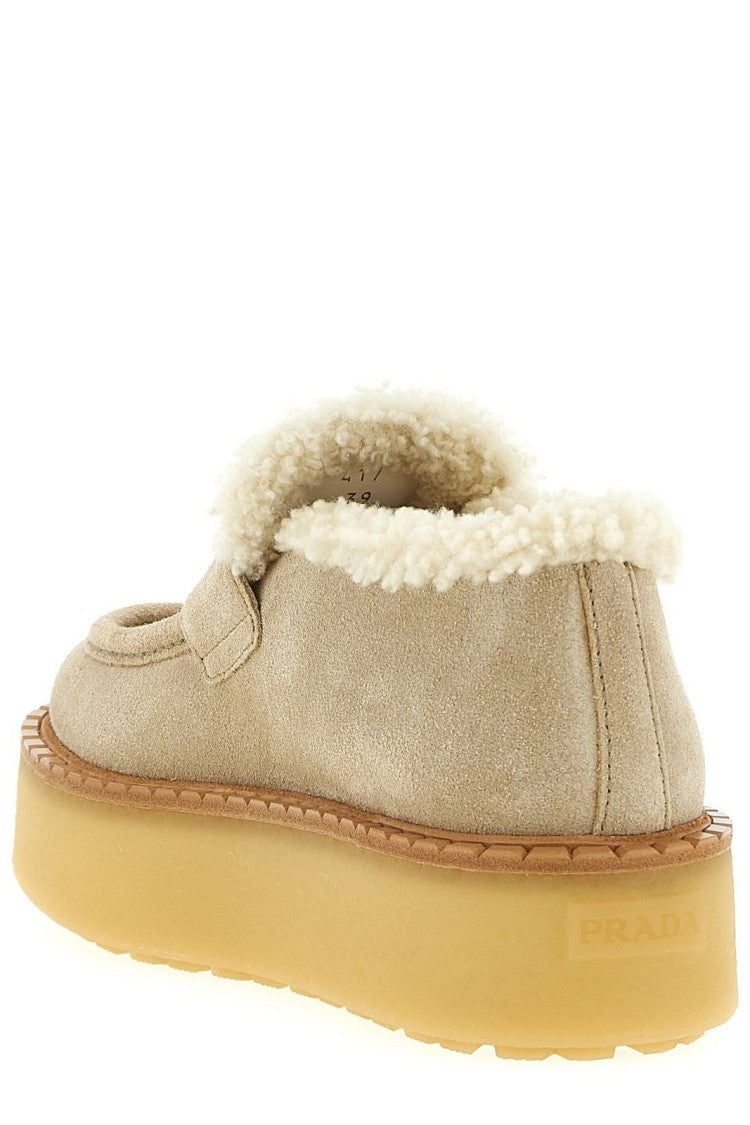 Prada Minimalist Flat Shoes With Rounded Toe And Low-Profile Sole